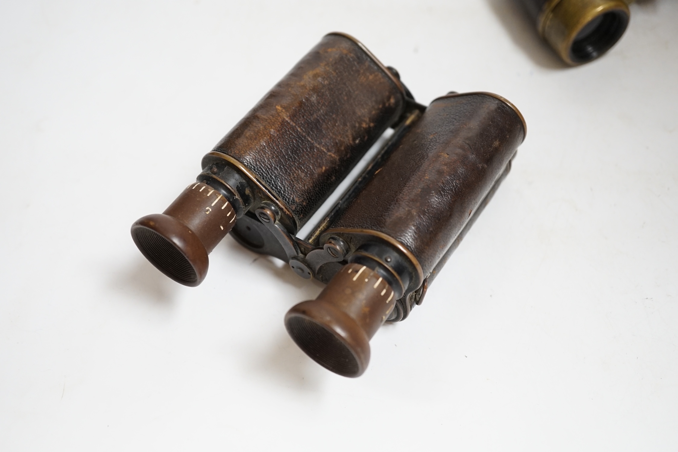 A pair of early Ross binoculars and one other pair of binoculars. Condition - fair